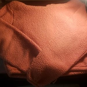 A slightly cropped long sleeve sweater